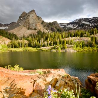 The sun peeked through the clouds for a short moment to light up Lake Blanche and the surrounding area below Sundial Peak.  